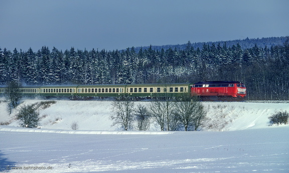 218 203