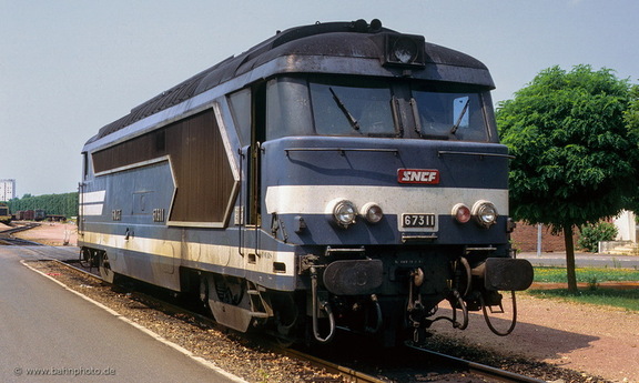 67311